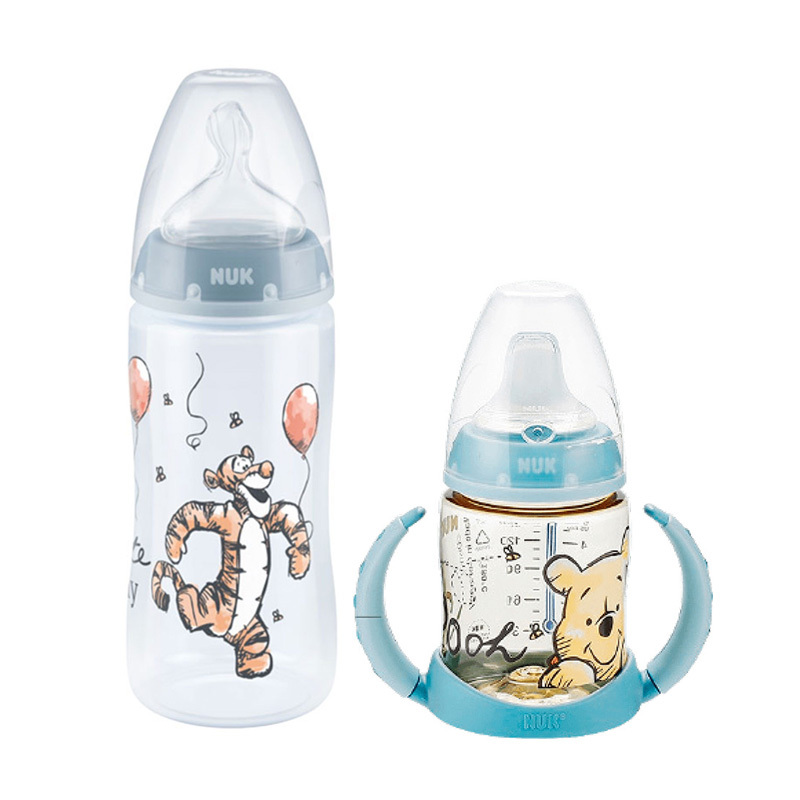 NUK Winnie Puuh Babyflasche 300ml mit Trinktülle&NUK Winnie Puuh First Choice Trinklernflasche 150ml mit Temperature Control