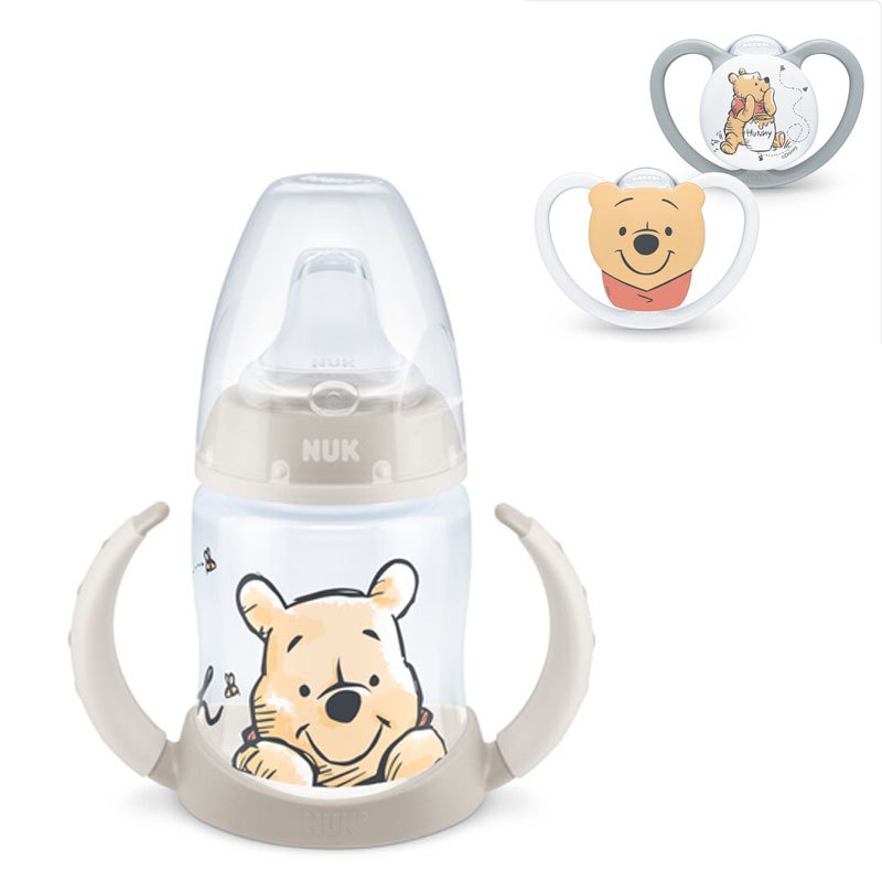 NUK Babytrinklernflasche/Trinklernbecher Disney "Winnie" 150 ml PP-Trinklern-Flasche mit Trinktülle aus Silikon u. Griff und Disney Winnie Puuh Space Silikon-Schnuller